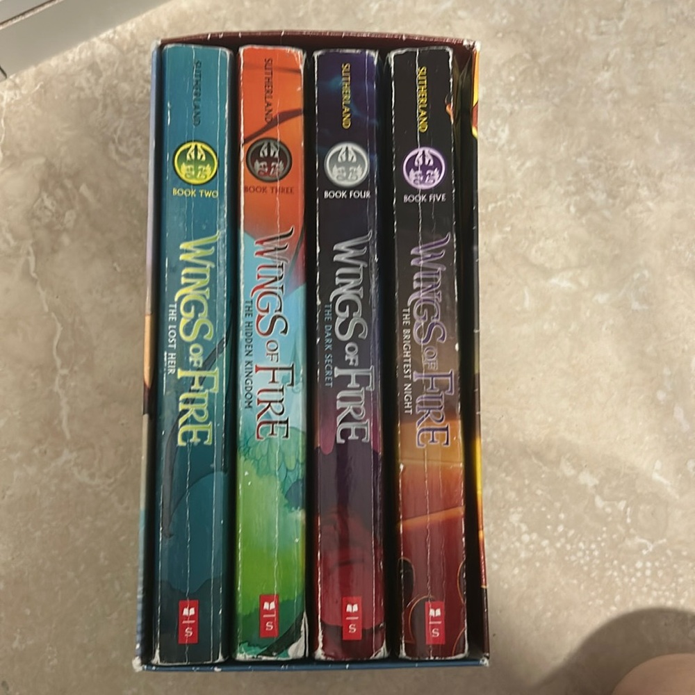 Wings of fire paperback books, 234 and five by TUi Sutherland